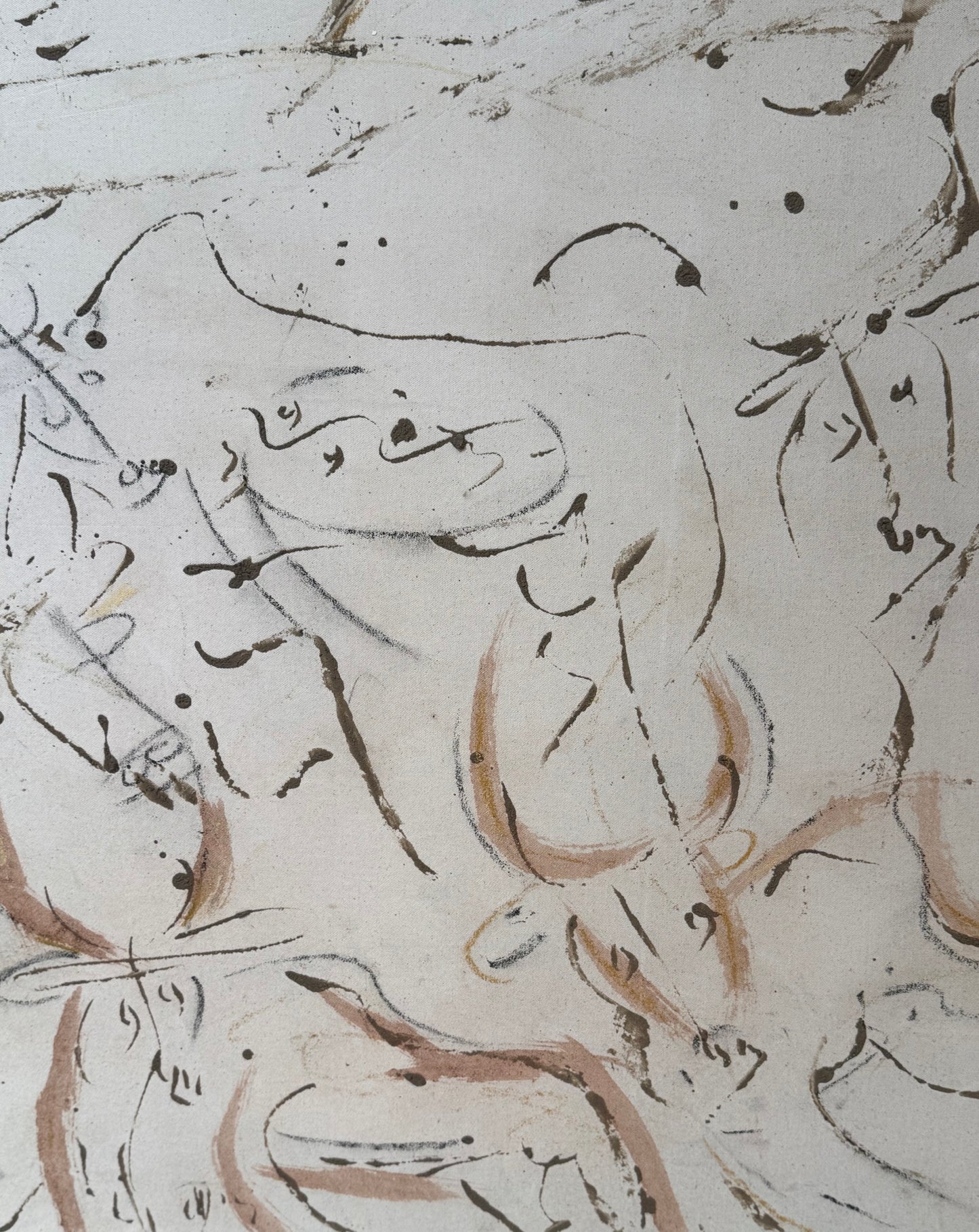 Close-up of calligraphic text on a textured surface